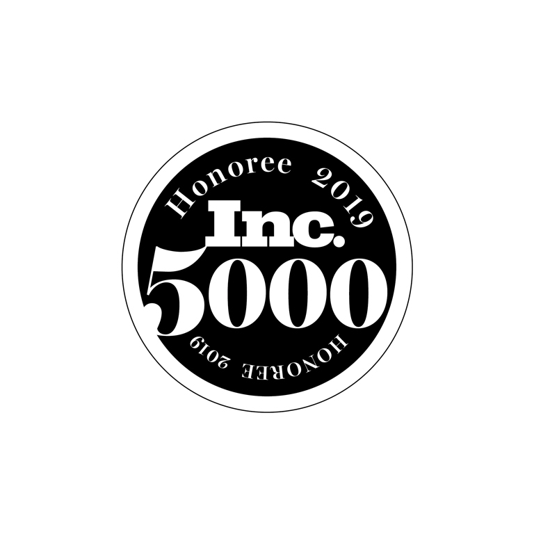 A black and white circular badge with the text Inc. 5000 in bold and Honoree 2019 written twice around the edge.