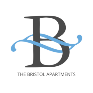 Logo for The Bristol Apartments featuring a large, stylized letter B in dark gray with a curved blue wave crossing through it, and the text THE BRISTOL APARTMENTS below.