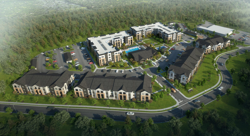 Aerial view of a modern apartment complex with multiple multi-story buildings, parking lots, landscaped green spaces, and a central swimming pool, surrounded by trees and curving roads.
