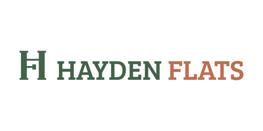 The logo features a large green H followed by the words HAYDEN FLATS, with HAYDEN in green and FLATS in orange, all on a white background.